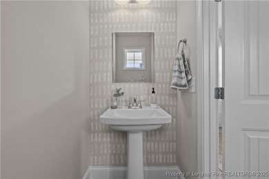 Welcome to 479 Kerr Lake Rd., a beautifully maintained 3-bedroom on Legacy Golf Links in North Carolina - for sale on GolfHomes.com, golf home, golf lot
