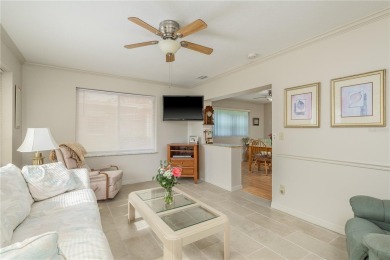 Located in the heart of Palm Harbor, 102 Stanford Drive is on Highland Lakes Executive Golf Course in Florida - for sale on GolfHomes.com, golf home, golf lot