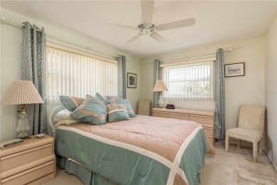 Located in the heart of Palm Harbor, 102 Stanford Drive is on Highland Lakes Executive Golf Course in Florida - for sale on GolfHomes.com, golf home, golf lot