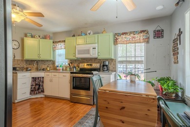 Charming cottage in the gated community of Tall Tree on on Cypress Creek Country Club in Texas - for sale on GolfHomes.com, golf home, golf lot