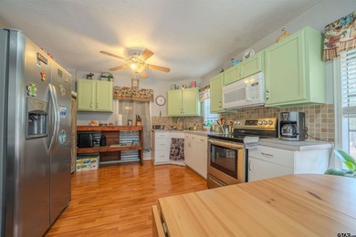 Charming cottage in the gated community of Tall Tree on on Cypress Creek Country Club in Texas - for sale on GolfHomes.com, golf home, golf lot