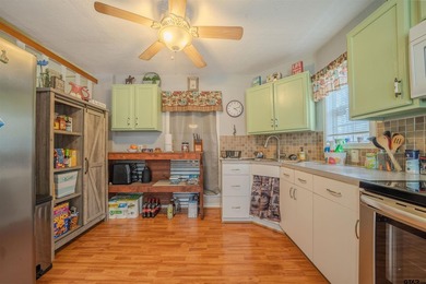 Charming cottage in the gated community of Tall Tree on on Cypress Creek Country Club in Texas - for sale on GolfHomes.com, golf home, golf lot