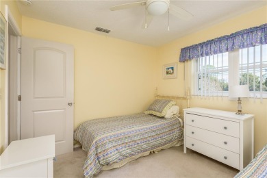 Located in the heart of Palm Harbor, 102 Stanford Drive is on Highland Lakes Executive Golf Course in Florida - for sale on GolfHomes.com, golf home, golf lot