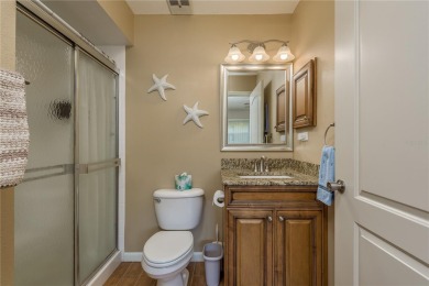Located in the heart of Palm Harbor, 102 Stanford Drive is on Highland Lakes Executive Golf Course in Florida - for sale on GolfHomes.com, golf home, golf lot