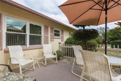 Located in the heart of Palm Harbor, 102 Stanford Drive is on Highland Lakes Executive Golf Course in Florida - for sale on GolfHomes.com, golf home, golf lot