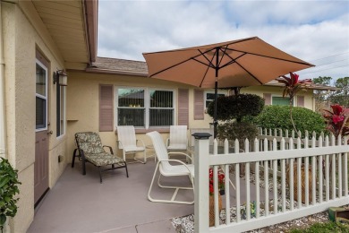 Located in the heart of Palm Harbor, 102 Stanford Drive is on Highland Lakes Executive Golf Course in Florida - for sale on GolfHomes.com, golf home, golf lot