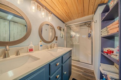 Charming cottage in the gated community of Tall Tree on on Cypress Creek Country Club in Texas - for sale on GolfHomes.com, golf home, golf lot