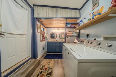 Charming cottage in the gated community of Tall Tree on on Cypress Creek Country Club in Texas - for sale on GolfHomes.com, golf home, golf lot