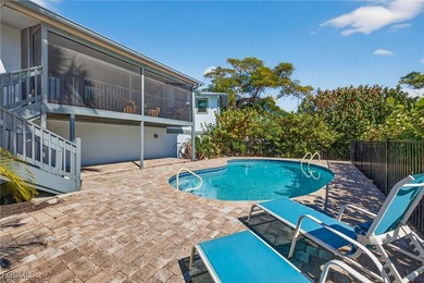 Completely reimagined and thoughtfully redesigned, this Sanibel on Beachview Golf Club in Florida - for sale on GolfHomes.com, golf home, golf lot