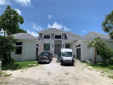 Step into this stunning coastal contemporary home located in The on The Sanctuary Golf Club in Florida - for sale on GolfHomes.com, golf home, golf lot