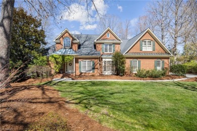 GOLF COURSE living at its finest! This custom-built brick home on Starmount Forest Country Club in North Carolina - for sale on GolfHomes.com, golf home, golf lot