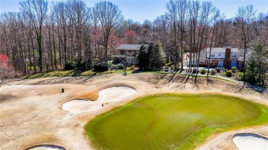 GOLF COURSE living at its finest! This custom-built brick home on Starmount Forest Country Club in North Carolina - for sale on GolfHomes.com, golf home, golf lot