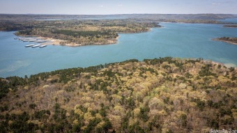 Lakefront lot at the end of a cove with a boat slip! Nice quiet on Mountain Ranch Golf Club in Arkansas - for sale on GolfHomes.com, golf home, golf lot