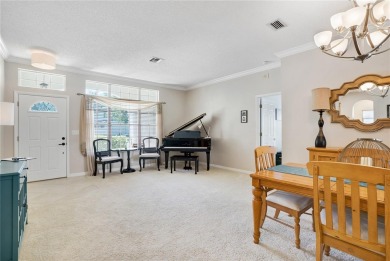 Welcome to this spacious, updated, 3 bedroom, plus a bonus room on East Lake Woodlands Country Club in Florida - for sale on GolfHomes.com, golf home, golf lot