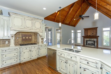 This custom home welcomes you with double front doors, an on Greystone Golf and Country Club-Founders Course in Alabama - for sale on GolfHomes.com, golf home, golf lot