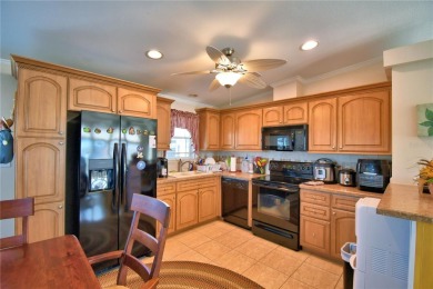 BEAUTIFUL FLORIDA HOME located in a 55+ community in the heart on Southern Dunes Golf and Country Club in Florida - for sale on GolfHomes.com, golf home, golf lot