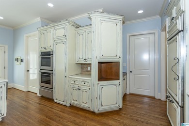 This custom home welcomes you with double front doors, an on Greystone Golf and Country Club-Founders Course in Alabama - for sale on GolfHomes.com, golf home, golf lot