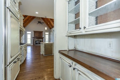 This custom home welcomes you with double front doors, an on Greystone Golf and Country Club-Founders Course in Alabama - for sale on GolfHomes.com, golf home, golf lot