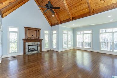 This custom home welcomes you with double front doors, an on Greystone Golf and Country Club-Founders Course in Alabama - for sale on GolfHomes.com, golf home, golf lot