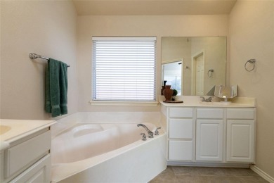Located on an interior corner lot and shaded by beautiful mature on Stonebridge Ranch Country Club in Texas - for sale on GolfHomes.com, golf home, golf lot