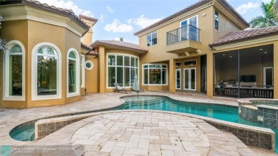 Experience luxury Parkland living in this custom-designed on Heron Bay Golf Club in Florida - for sale on GolfHomes.com, golf home, golf lot