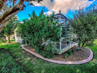 Charming Split Plan Home Near Mulberry Grove---BOND PAID!!-- on Nancy Lopez Legacy Golf and Country Club in Florida - for sale on GolfHomes.com, golf home, golf lot