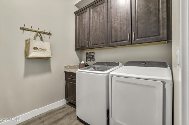 Experience unparalleled luxury and convenience in this stunning on Flagstaff Ranch Golf Club in Arizona - for sale on GolfHomes.com, golf home, golf lot