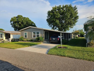 This meticulously maintained 1983 Barr 2bd 2ba home has been on Grasslands Golf and Country Club in Florida - for sale on GolfHomes.com, golf home, golf lot