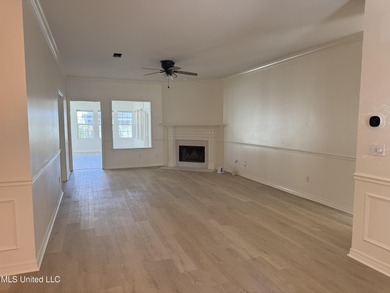 Welcome home to this recently updated 3-bedroom, 2-bath brick on Diamondhead Country Club in Mississippi - for sale on GolfHomes.com, golf home, golf lot