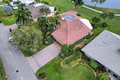 A spectaculate view awaits you as you enter this bright, airy on Eastpointe Country Club in Florida - for sale on GolfHomes.com, golf home, golf lot