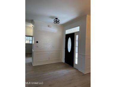 Welcome home to this recently updated 3-bedroom, 2-bath brick on Diamondhead Country Club in Mississippi - for sale on GolfHomes.com, golf home, golf lot