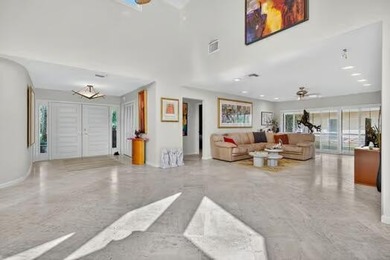 A spectaculate view awaits you as you enter this bright, airy on  in Florida - for sale on GolfHomes.com, golf home, golf lot