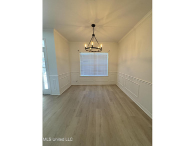 Welcome home to this recently updated 3-bedroom, 2-bath brick on Diamondhead Country Club in Mississippi - for sale on GolfHomes.com, golf home, golf lot