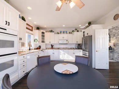 Beautifully updated, custom built home perfectly set within the on WeaverRidge Golf Club in Illinois - for sale on GolfHomes.com, golf home, golf lot