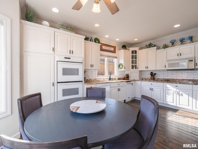 Beautifully updated, custom built home perfectly set within the on WeaverRidge Golf Club in Illinois - for sale on GolfHomes.com, golf home, golf lot