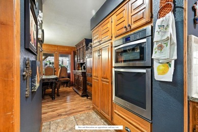 Two-story townhouse in Fairway Oaks Country Club with 3 bedrooms on Abilene Country Club - South Course in Texas - for sale on GolfHomes.com, golf home, golf lot