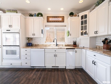 Beautifully updated, custom built home perfectly set within the on WeaverRidge Golf Club in Illinois - for sale on GolfHomes.com, golf home, golf lot