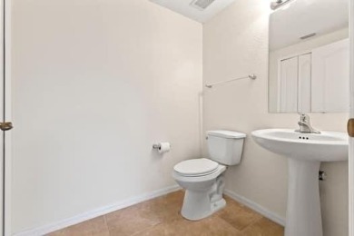 TAKE A LOOK AT THIS SHARP & CONTEMPORARY 3 BEDROOM 2 1/2 BATH on Gator Trace Golf and Country Club in Florida - for sale on GolfHomes.com, golf home, golf lot