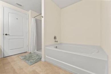 TAKE A LOOK AT THIS SHARP & CONTEMPORARY 3 BEDROOM 2 1/2 BATH on Gator Trace Golf and Country Club in Florida - for sale on GolfHomes.com, golf home, golf lot