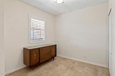 TAKE A LOOK AT THIS SHARP & CONTEMPORARY 3 BEDROOM 2 1/2 BATH on Gator Trace Golf and Country Club in Florida - for sale on GolfHomes.com, golf home, golf lot
