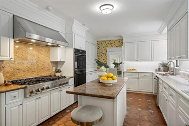 Rare mediterranean estate exuding sophistication and beach vibes on Miami Beach Golf Club in Florida - for sale on GolfHomes.com, golf home, golf lot