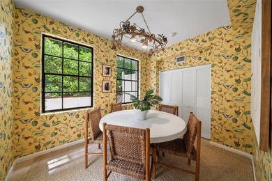 Rare mediterranean estate exuding sophistication and beach vibes on Miami Beach Golf Club in Florida - for sale on GolfHomes.com, golf home, golf lot