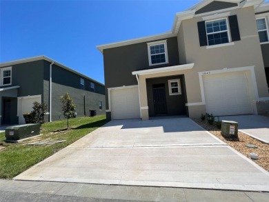 Enjoy Corner-Unit Townhouse with Golf Course Views -Davenport on Ridgewood Lakes Golf and Country Club in Florida - for sale on GolfHomes.com, golf home, golf lot