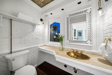 Rare mediterranean estate exuding sophistication and beach vibes on Miami Beach Golf Club in Florida - for sale on GolfHomes.com, golf home, golf lot