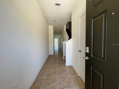 Enjoy Corner-Unit Townhouse with Golf Course Views -Davenport on Ridgewood Lakes Golf and Country Club in Florida - for sale on GolfHomes.com, golf home, golf lot