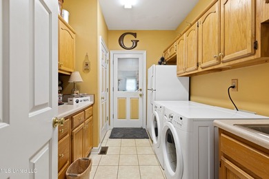 Luxurious golf community living on the third hole of Timber on The Plantation Golf Club in Mississippi - for sale on GolfHomes.com, golf home, golf lot