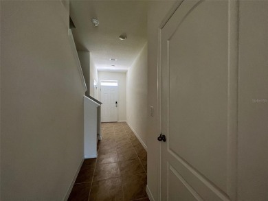 Enjoy Corner-Unit Townhouse with Golf Course Views -Davenport on Ridgewood Lakes Golf and Country Club in Florida - for sale on GolfHomes.com, golf home, golf lot