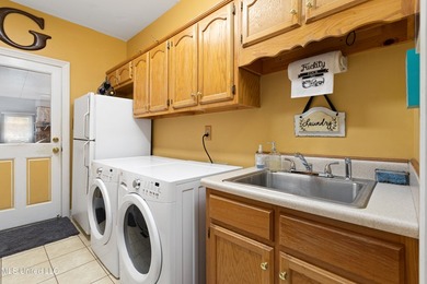 Luxurious golf community living on the third hole of Timber on The Plantation Golf Club in Mississippi - for sale on GolfHomes.com, golf home, golf lot