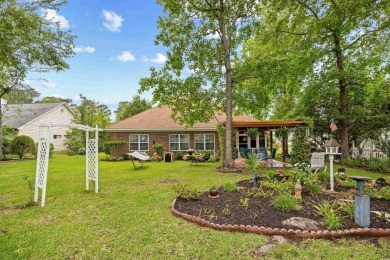 Beautiful all-brick 3br/2.5ba home on a large, landscaped lot in on Palmetto Greens Golf and Country Club in South Carolina - for sale on GolfHomes.com, golf home, golf lot