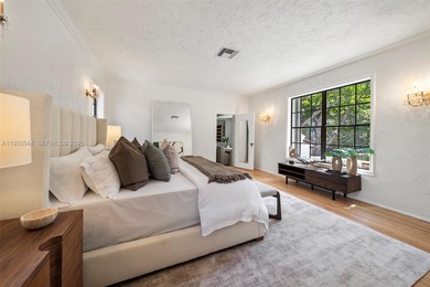 Rare mediterranean estate exuding sophistication and beach vibes on Miami Beach Golf Club in Florida - for sale on GolfHomes.com, golf home, golf lot